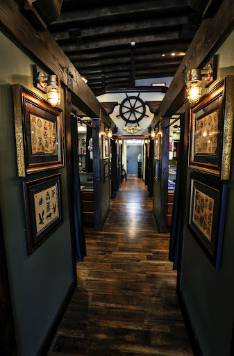 Explore quarter size tattoo ideas, creative tattoo ideas in Oceanside, available at The Arcade Oceanside Tattoo