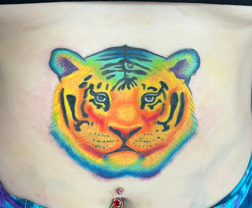 Explore sun tattoo ideas for men, creative tattoo ideas in Jacksonville, available at Jacksonville Piercing & Tattoo