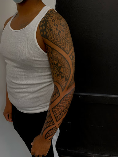 Explore kiss band tattoo ideas, creative tattoo ideas in Mount Clemens, available at Hand & Heart Tattoo