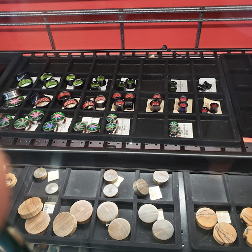 Explore tattoo geometric ideas, creative tattoo ideas in Poplar Bluff, available at The Marked Bar Music Venue