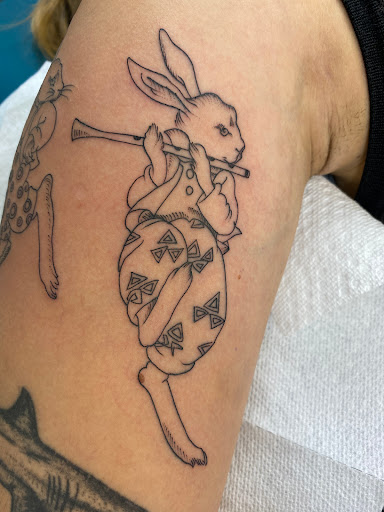 Explore february birth flower tattoo ideas, creative tattoo ideas in Ferndale, available at Signature Tattoo