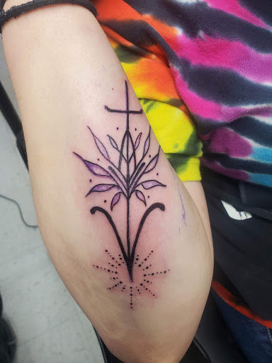 Explore aster flower tattoo ideas, creative tattoo ideas in Salem, available at Outwest Tattoo and body piercing ,30 years of tattooing,only life time guarantee