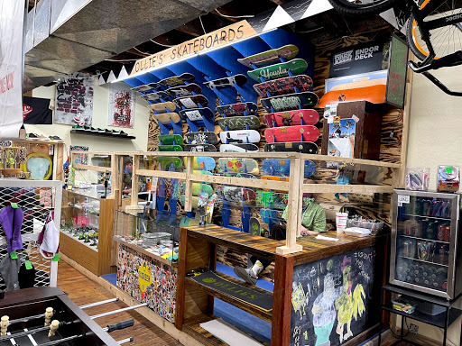 Skateboard shop upstairs!