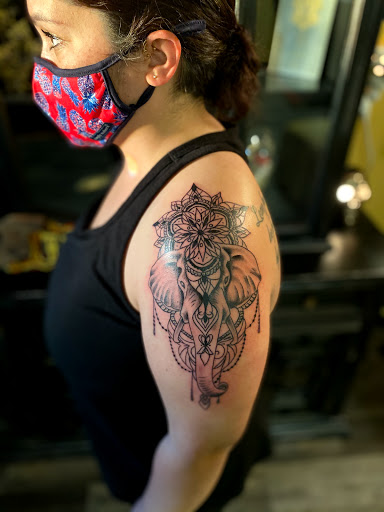 Explore gangster tattoo ideas for men, creative tattoo ideas in Warner Robins, available at Untold Pain Tattoo Studio