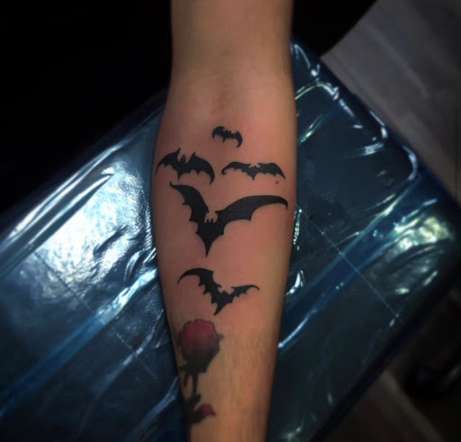 Explore military dog tag tattoo ideas, creative tattoo ideas in Orange Park, available at Big City Tattoo and Piercing