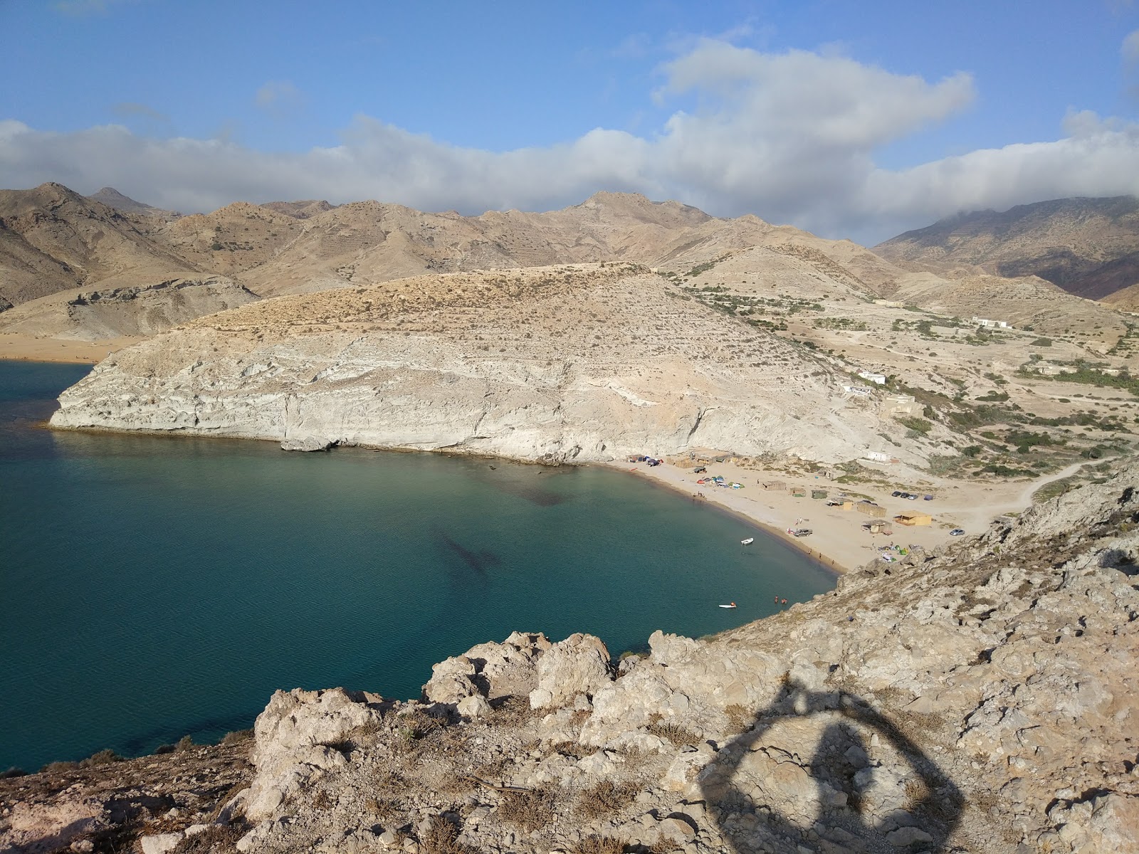 Foto van Playa Tcharrana met turquoise puur water oppervlakte