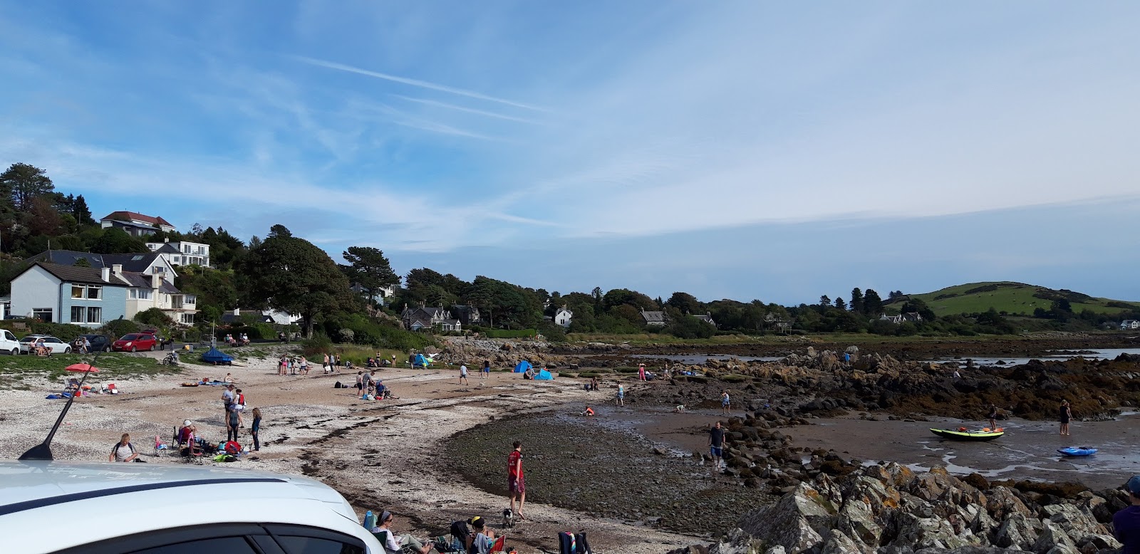 Photo of Rockcliffe Beach and the settlement