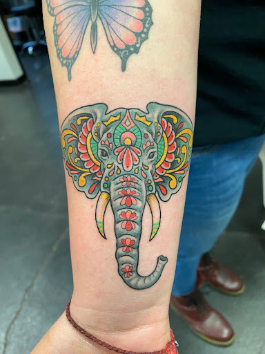 Explore cheek tattoo ideas, creative tattoo ideas in Raleigh, available at Raleigh Tattoo Company