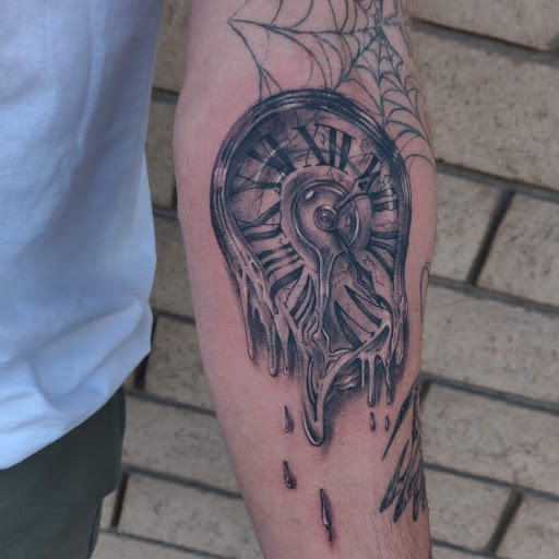 Explore cross hand tattoo ideas, creative tattoo ideas in Los Alamitos, available at Mr. Inkwells Classy Tattoos