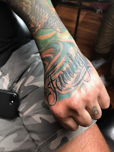 Explore men's neck tattoo ideas, creative tattoo ideas in Covington, available at Arts Ink Tattoo Studio