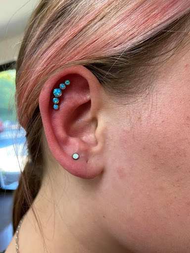 Explore first child tattoo ideas for dad, creative tattoo ideas in Waukesha, available at Piercing by Kelly - Waukesha Piercing