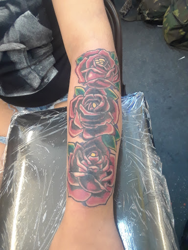 Explore upper arm men tattoo ideas, creative tattoo ideas in Jacksonville, available at Erics Tattoos