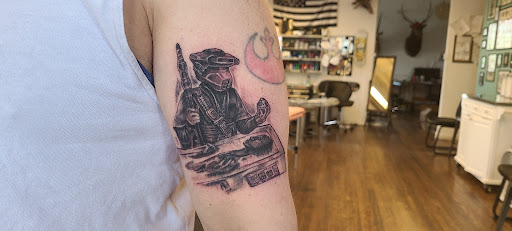 Explore december birthday tattoo ideas, creative tattoo ideas in Omaha, available at Grinn & Barrett Tattoo