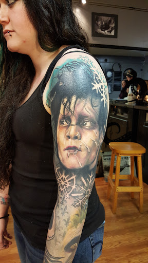 Explore flower tattoo ideas for guys, creative tattoo ideas in East Freedom, available at Midnight Ink Tattoo Parlor