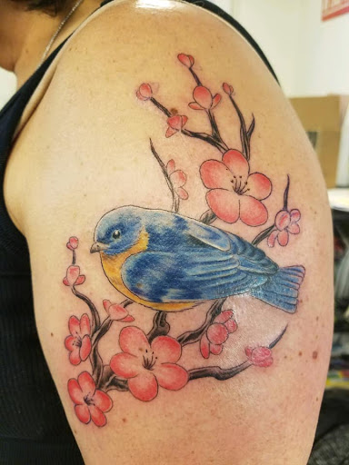 Explore good neck tattoo ideas, creative tattoo ideas in Pelham, available at Tattoo Fever