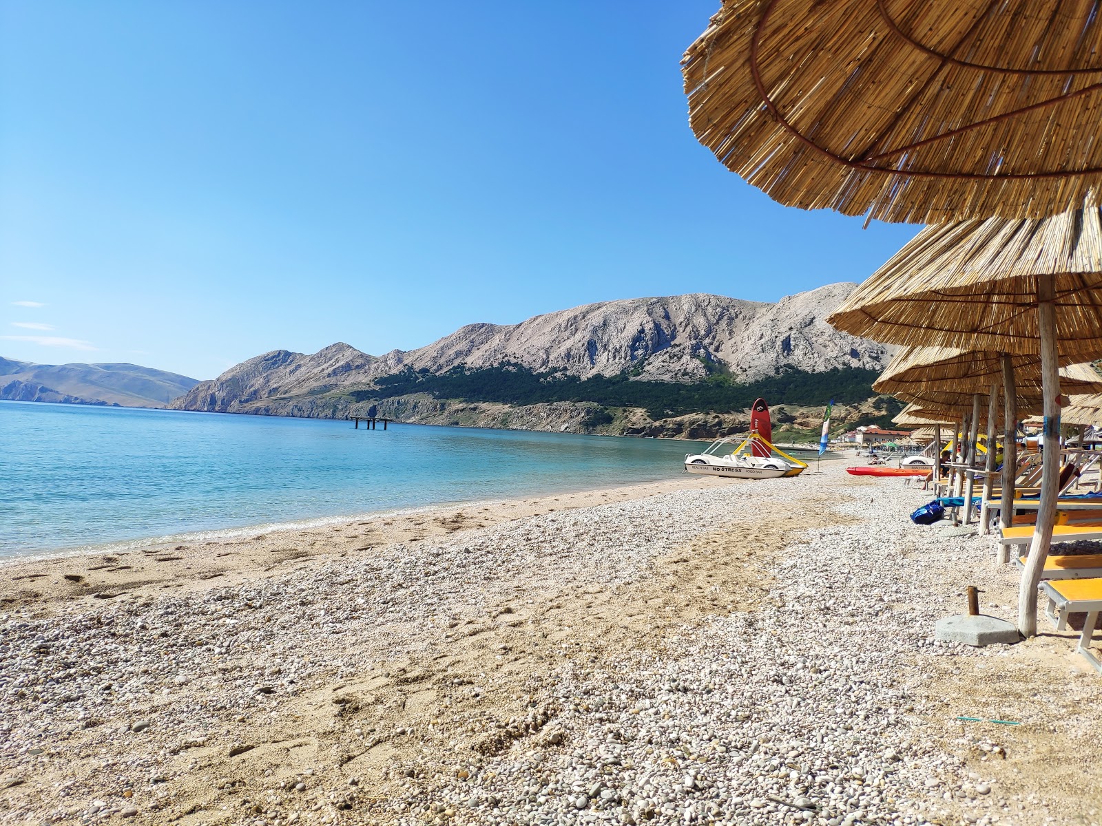 Foto di Spiaggia Vela con una superficie del acqua turchese