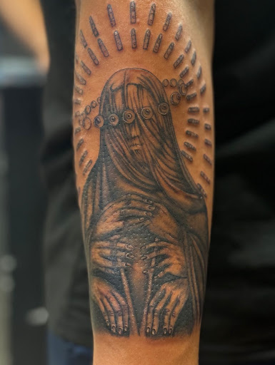 Explore ghost tattoo ideas, creative tattoo ideas in Houston, available at 333 Tattoo Studio HTX