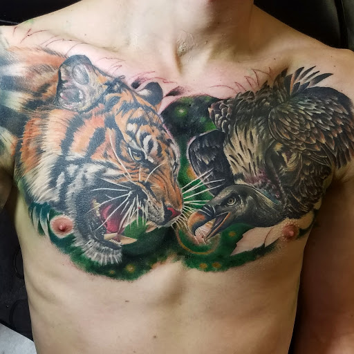 Explore dog paw print tattoo ideas, creative tattoo ideas in Lewisburg, available at Acacia Tattoo Co.