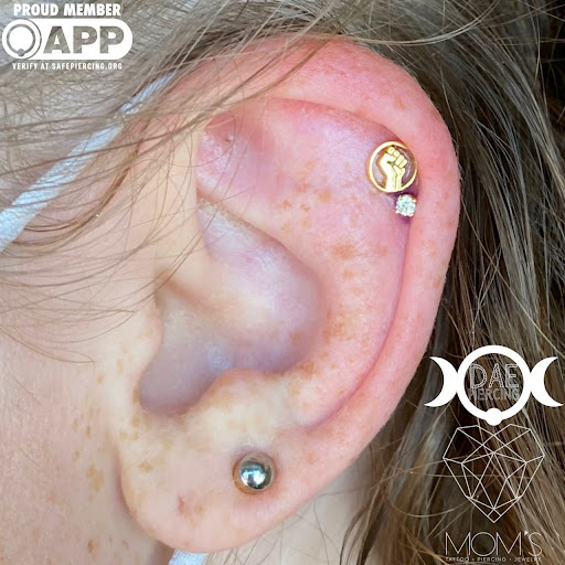 Explore rock tattoo ideas, creative tattoo ideas in Spokane, available at Moms Custom Tattoo & Body Piercing