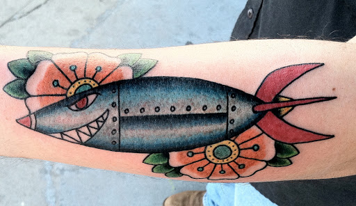 Explore wall-e tattoo ideas, creative tattoo ideas in Reno, available at Aces Tattoo