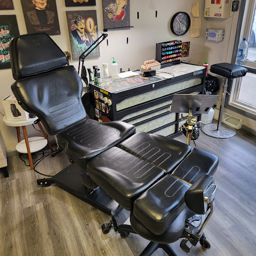 Explore lower arm tattoos ideas for guys, creative tattoo ideas in Muncie, available at Forbidden Fruit Tattoo and Piercing