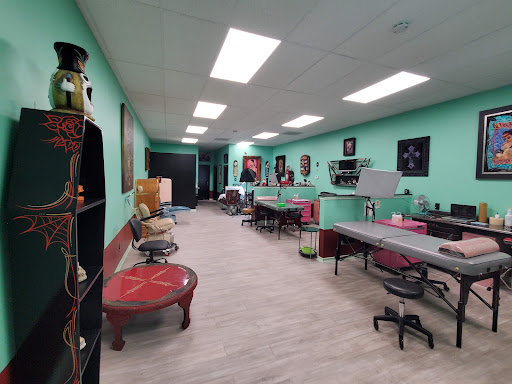 Explore men back tattoos ideas, creative tattoo ideas in Upland, available at Greaskull Tattoo Alley