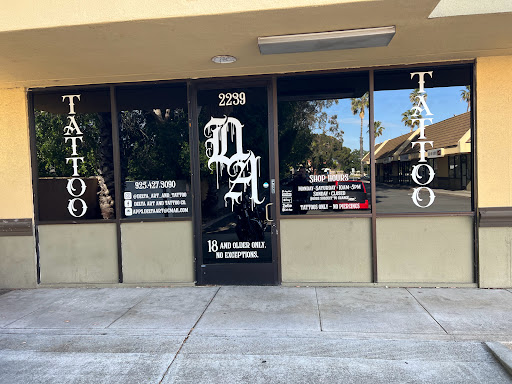 Explore matching halloween tattoo ideas, creative tattoo ideas in Pittsburg, available at Delta Art & Tattoo