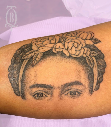 Explore crown of thorns tattoo ideas, creative tattoo ideas in Marietta, available at The Queen Bee Tattoo and Piercing Parlour