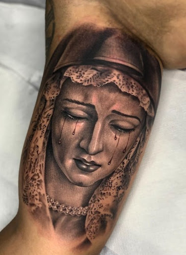 Explore rock tattoo ideas, creative tattoo ideas in Venice, available at Ink Monkey Tattoo and Piercing