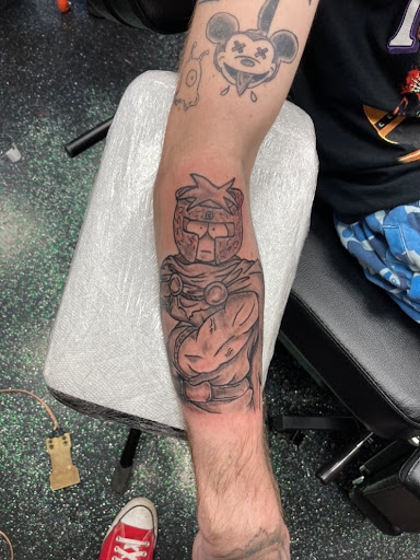 Find bracelet tattoo ideas for females for your next unique tattoo in Slippery Rock at Dinky Dachshund Tattoo Parlor