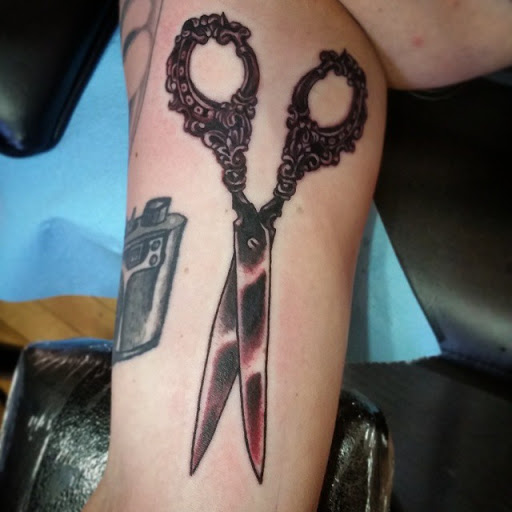 Explore line tattoo ideas for females, creative tattoo ideas in Minneapolis, available at Minneapolis Tattoo Shop