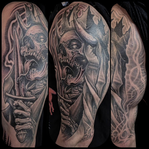 Explore mens ring tattoo ideas, creative tattoo ideas in Menomonee Falls, available at Cal Tattoo