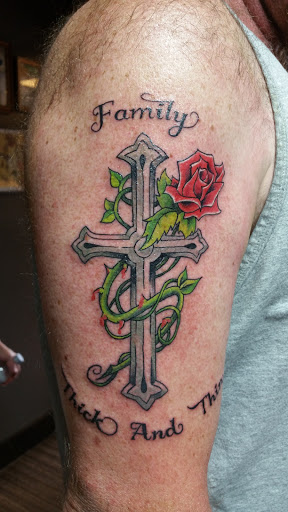 Explore music tattoo ideas, creative tattoo ideas in Foley, available at Black Sheep Custom Tattoos and Piercings