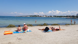 Fotografie cu Omega beach - locul popular printre cunoscătorii de relaxare