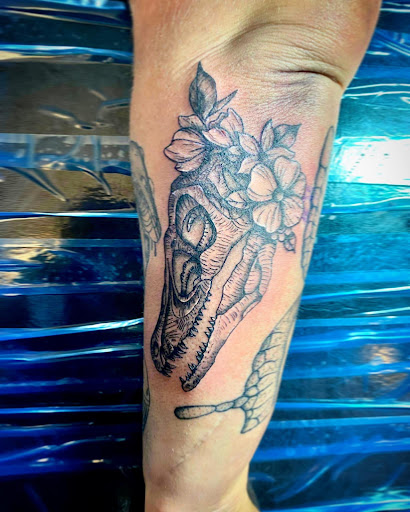 Explore thigh tattoo ideas for females, creative tattoo ideas in Kokomo, available at Happys Tattoo Studio