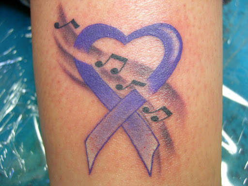 Explore rattlesnake tattoo ideas, creative tattoo ideas in Seaside, available at Creative Visions Ink Tattoo & Body Piercing Studio - Call for Appointment