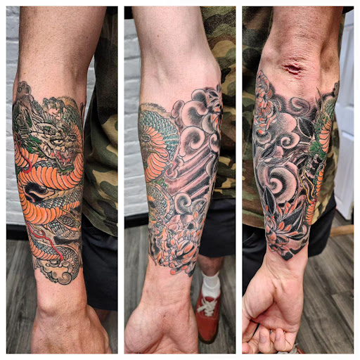 Explore guy leg tattoo ideas, creative tattoo ideas in Cumberland, available at Queen City Ink