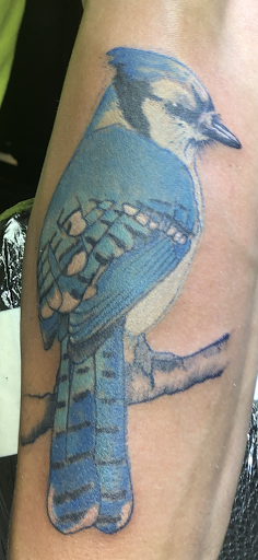 Explore blue flame tattoo ideas, creative tattoo ideas in Berlin, available at Tattoo Drews