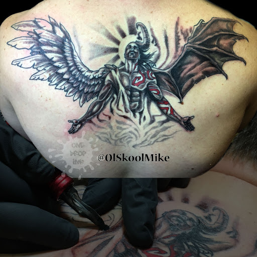 Explore gun tattoo ideas for men, creative tattoo ideas in Nashville, available at One Drop Ink Tattoo Parlour and Gallery