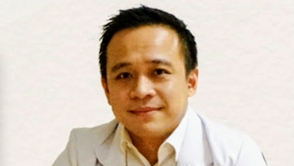 Dr. Rezki Tantular, SpP(K), FAPSR (Spesialis Paru dan Pernapasan)