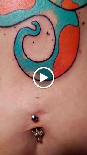 Explore mens ring tattoo ideas, creative tattoo ideas in Benton, available at Spectrum Tattoo