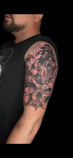 Explore book tattoo ideas for females, creative tattoo ideas in Stanton, available at Olde Realm Tattoo Parlor