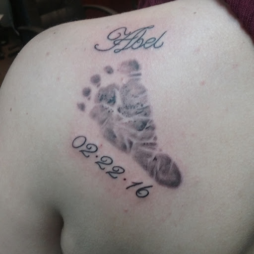 Explore mens tattoo ideas chest, creative tattoo ideas in Decatur, available at Exclusive Ink Tattoos & Body Piercings 22nd & Wood