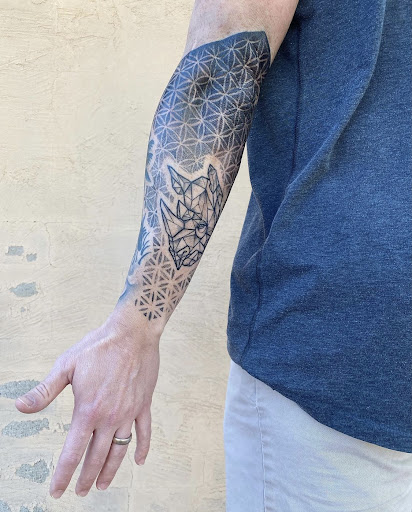 Explore hammer tattoo ideas, creative tattoo ideas in Carefree, available at Lucid Arts - Design & Tattoo