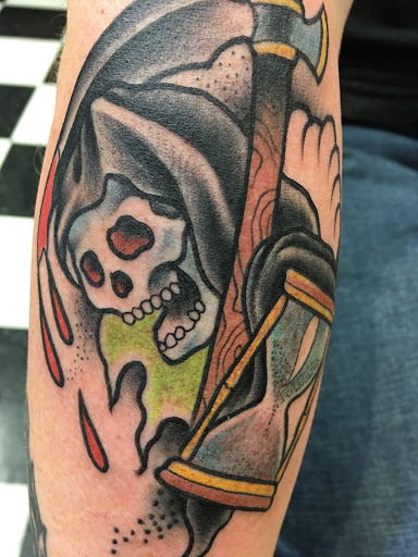 Explore kiss band tattoo ideas, creative tattoo ideas in Albany, available at Make Your Mark Tattoo