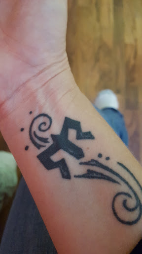 Explore mountain biking tattoo ideas, creative tattoo ideas in Madison, available at Ultimate Arts Tattoo