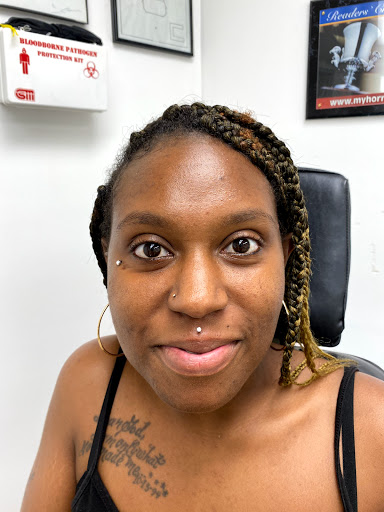 Explore elegant spine tattoo ideas, creative tattoo ideas in Myrtle Beach, available at Professional Body Piercing by Jackie