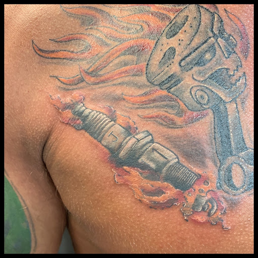 Explore mens chest tattoo ideas, creative tattoo ideas in Louisville, available at Wizink Tattoos