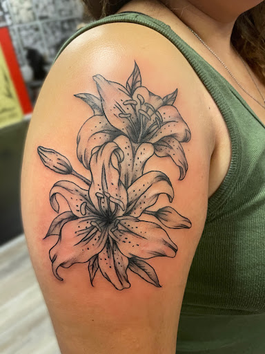 Explore bookworm tattoo ideas, creative tattoo ideas in Vancouver, available at New Ink Tattoo