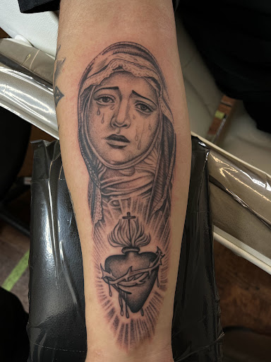 Explore princess and the frog tattoo ideas, creative tattoo ideas in Rogers, available at Ink Solutions Tattoo